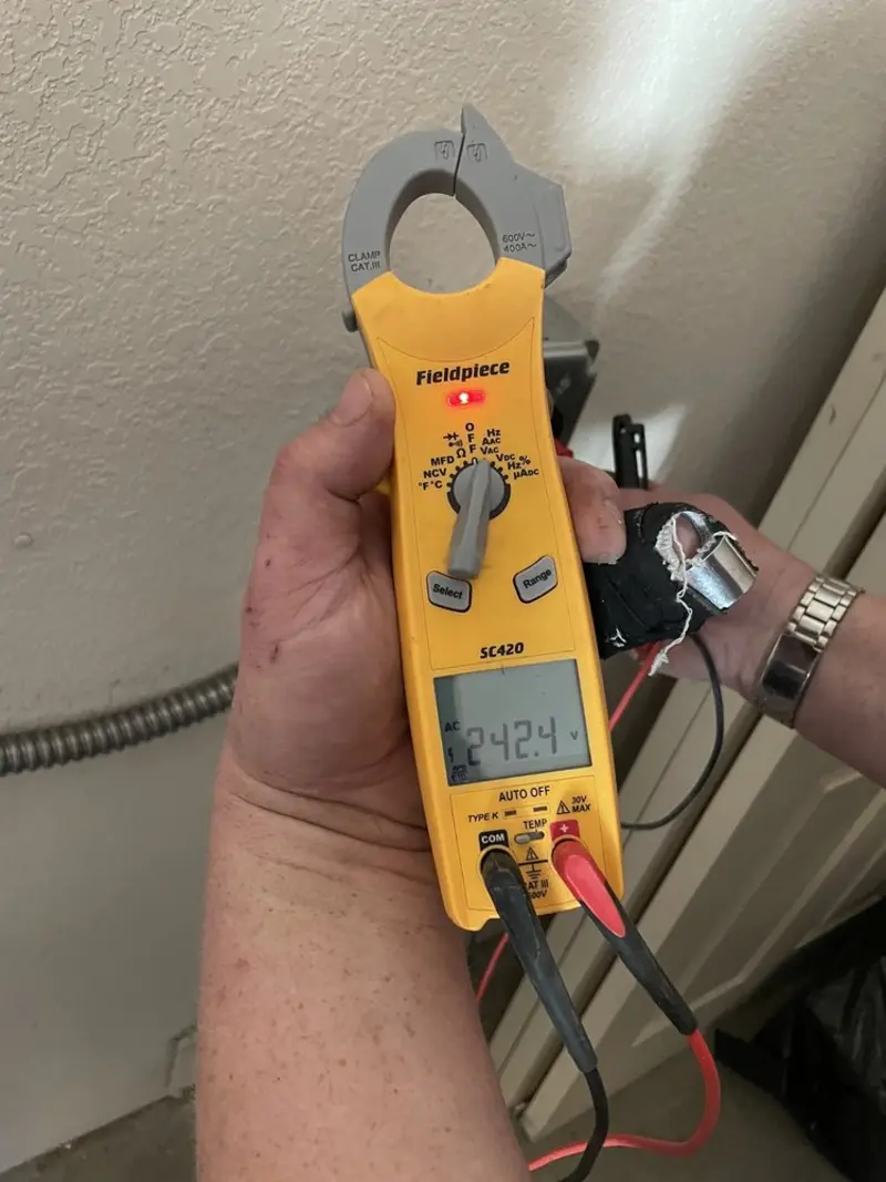 Voltage testing with clamp meter during Aluminum Wiring Replacement in Andalusia